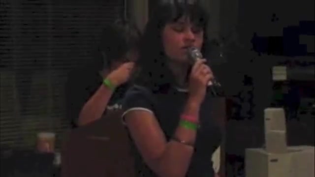 A teenage girl singing